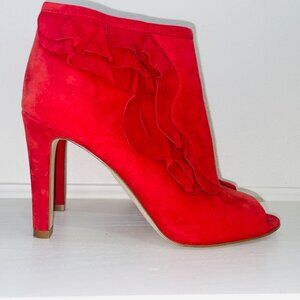 Fashion and flare! Red suede open toe booties size 7.5. Gently worn on bottom